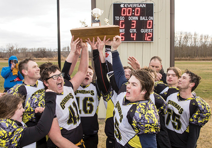The Generals hoisting the championship trophy.<br />